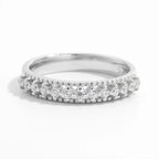 925 Sterling Silver Zircon Inlaid Ring with intricate design, showcasing sparkling zircon stones on a polished silver band.