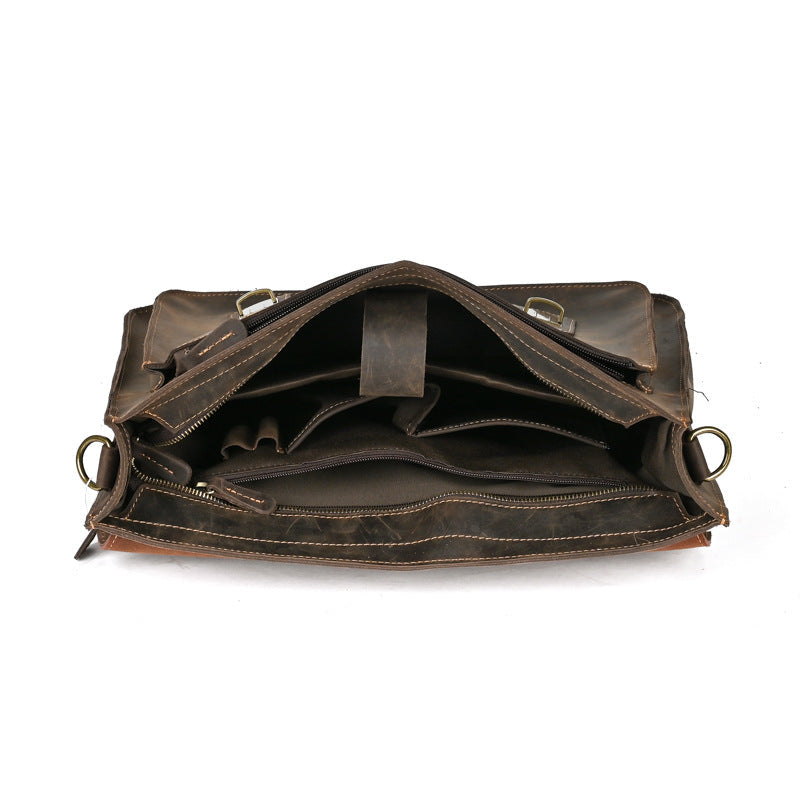 Plush Fashion Hub leather one-shoulder crossbody laptop bag with top layer leather design and adjustable strap.