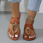 Women's open toe low heel sandal by Trendsi with gold accent detail, featuring a sleek design and stylish fit.