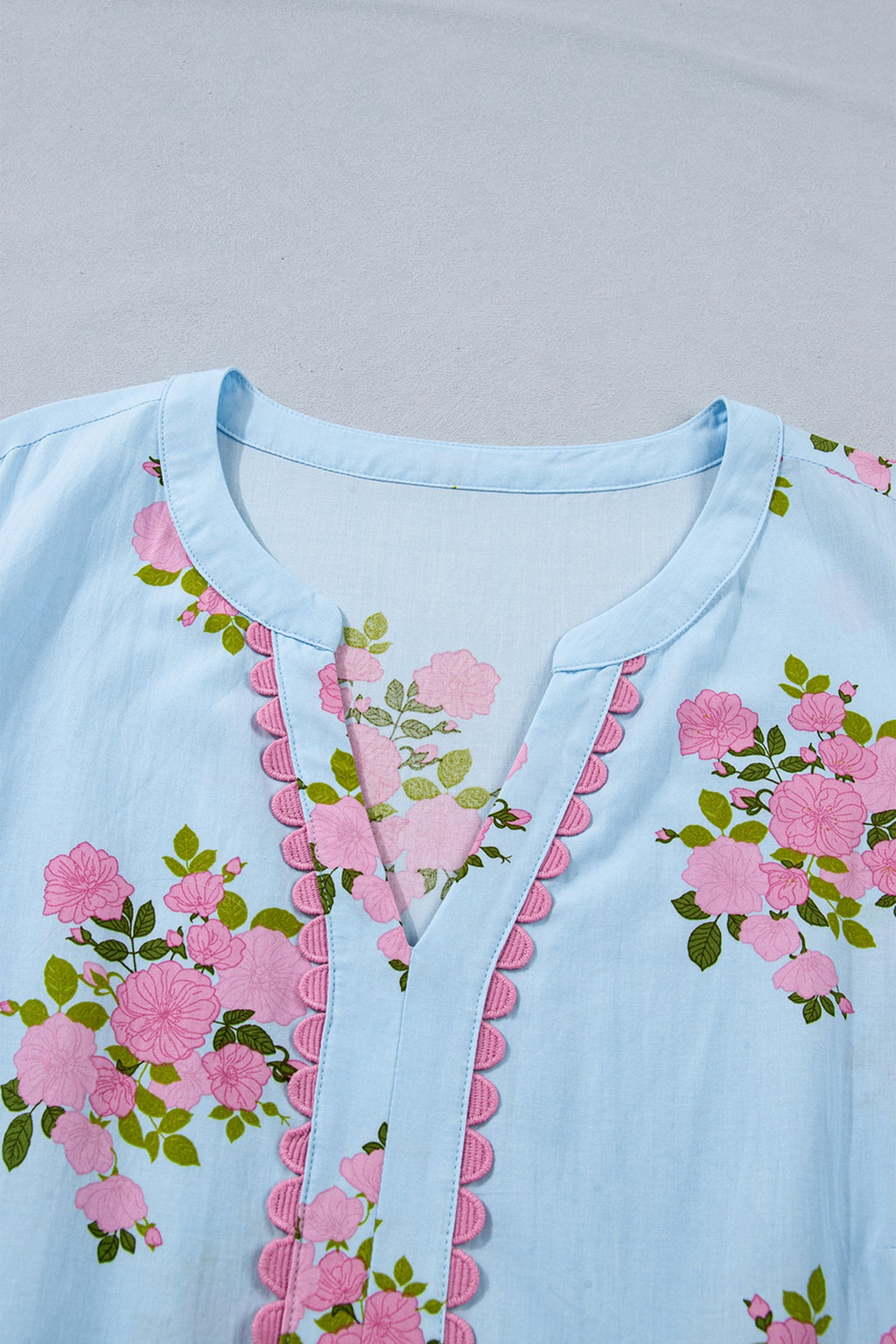 Plus size Lucy Print Scalloped Trim maxi dress by Threaded Pear, featuring a vibrant floral pattern and scalloped hem detail.