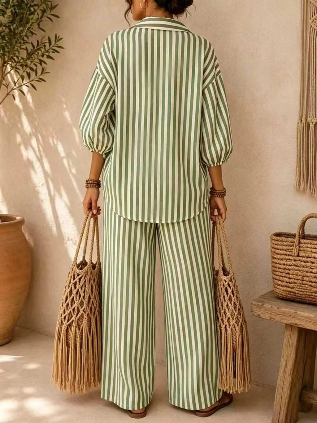 Plus size striped puff sleeve shirt and wide-leg drawstring pants set by Trendsi, featuring comfortable fabric and stylish design.