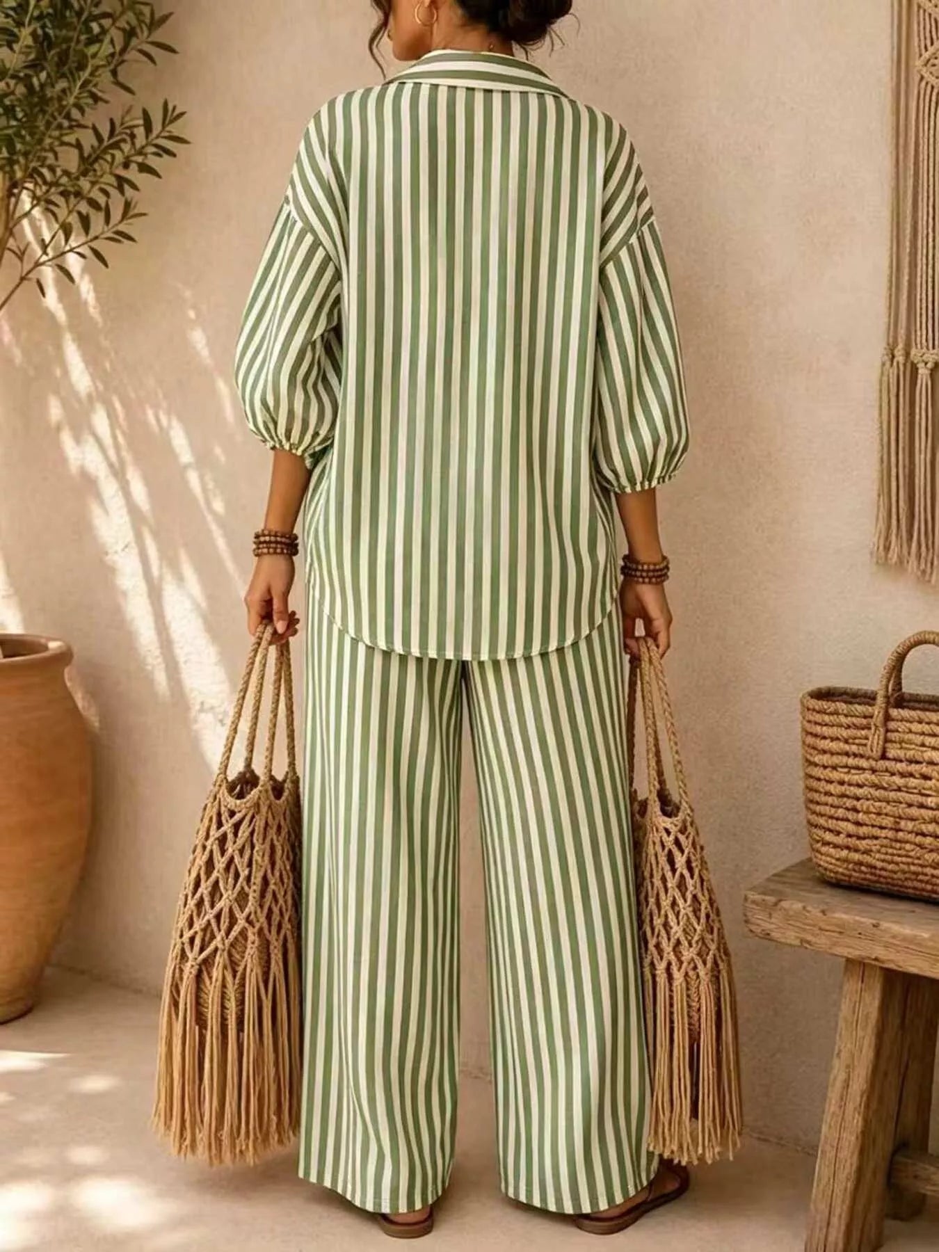 Plus size striped puff sleeve shirt and wide-leg drawstring pants set by Trendsi, featuring comfortable fabric and stylish design.