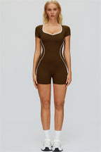Fitglutes Activewear The Whisper Romper in black, lightweight gym and workout romper with stylish, comfortable fit for active wear.