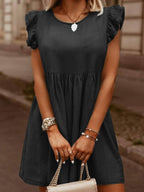 VYSN full size denim dress with ruffled round neck, cap sleeves, and casual fashion style displayed on a mannequin.