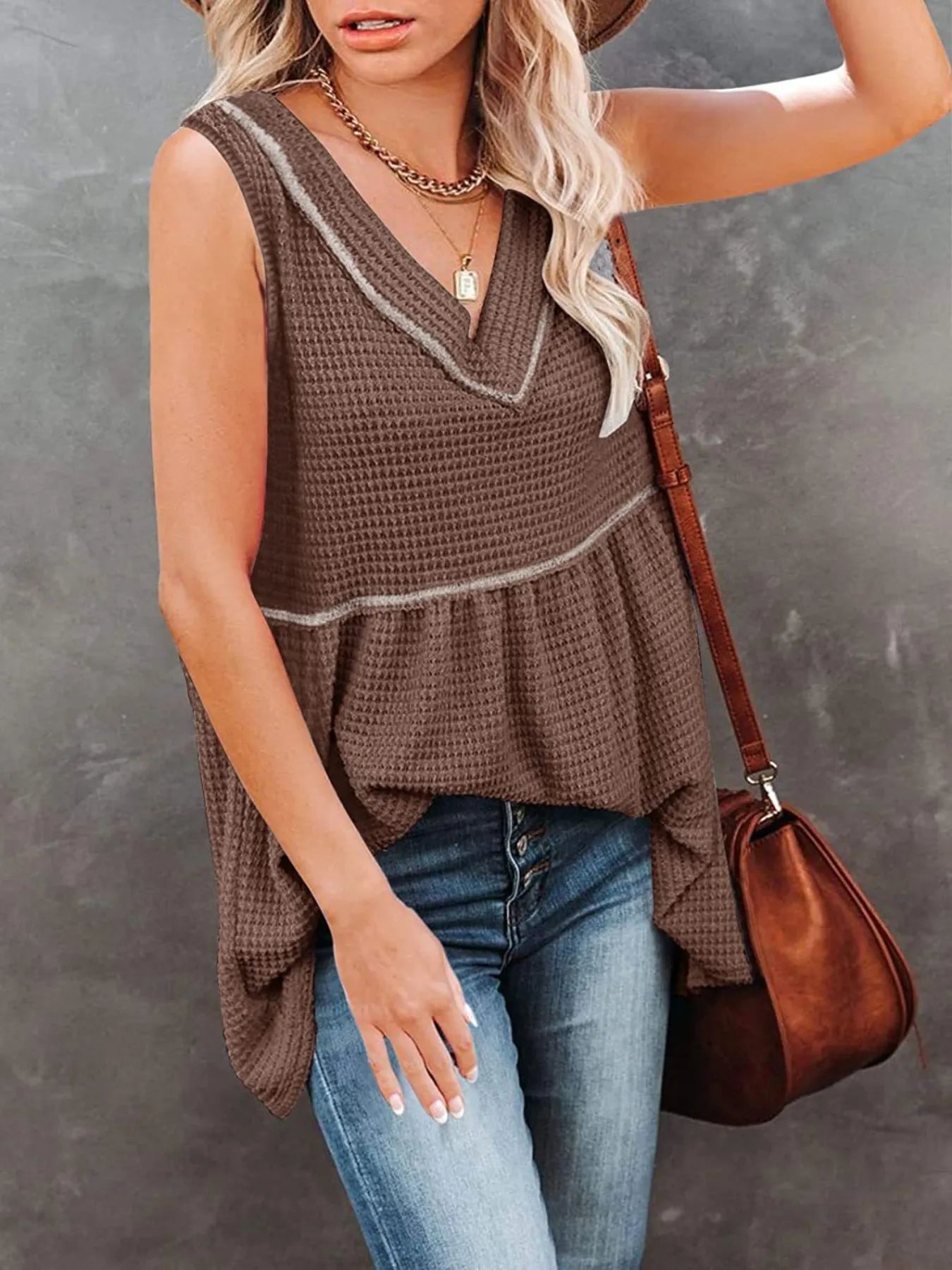V-neck waffle knit tank top with contrast stitching, trendy sleeveless top by Trendsi, shown in a close-up image.