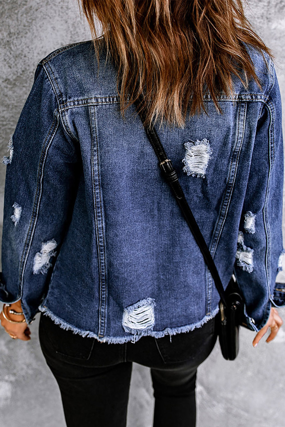Distressed denim jacket with mixed print and button front from Plush Fashion Hub, featuring a casual, trendy design.