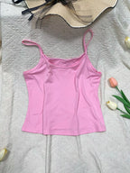 Solid color scoop neck cami tank top by Plush Fashion Hub, featuring a simple, sleeveless design with a scoop neckline.
