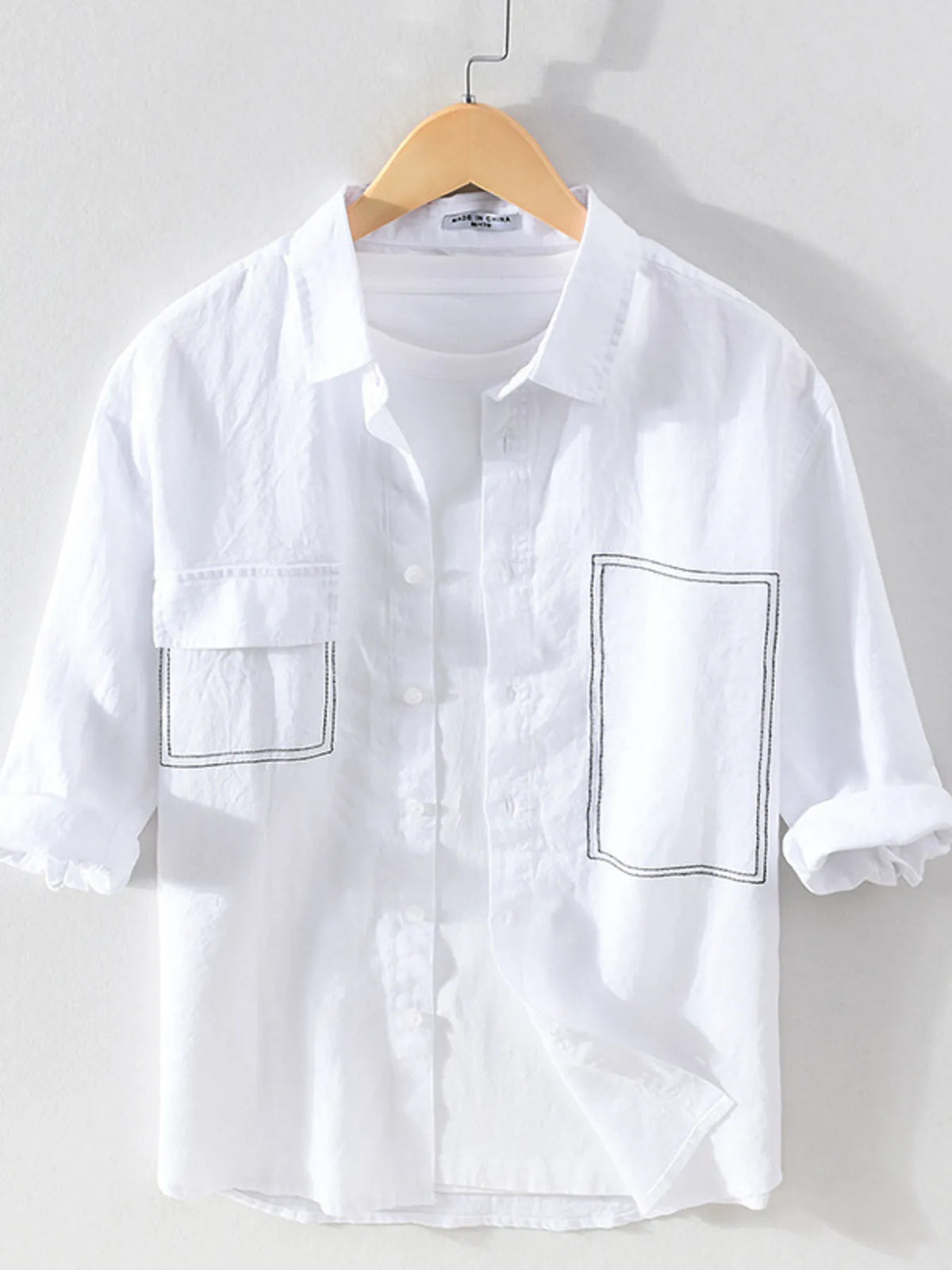 Men's plus size button-up shirt with front pocket, stylish and comfortable Trendsi men's shirt in a versatile design.
