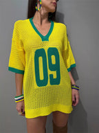 Women's oversized V-neck openwork sweater by Trendsi, lightweight knit pullover with stylish openwork pattern and relaxed fit.