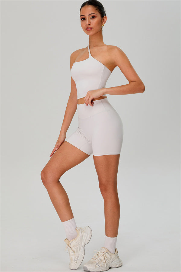 Fitglutes activewear one-shoulder crop top and shorts 2-piece set, athletic gymwear with stylish design, perfect for workout and sports.