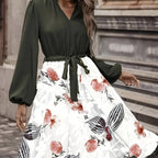 Ladies' casual fashion printed V-neck waist strap dress by FitiqueFit, featuring a colorful pattern and relaxed fit.