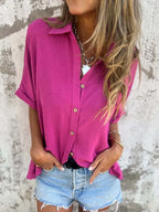 Women's collared half sleeve button-down blouse from Trendsi, featuring a sophisticated office top with a classic design.