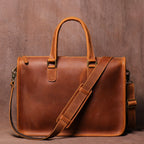 Men's Crazy Horse leather briefcase from Plush Fashion Hub with a sleek design, carrying a laptop with a sturdy handle and classic style.
