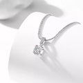 Sterling silver moissanite necklace with a 1-carat center stone, showcasing a sparkling, elegant jewelry piece.