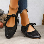 Floral cutout tied slip-on sandals by Plush Fashion Hub featuring open-toe design and decorative floral accents.