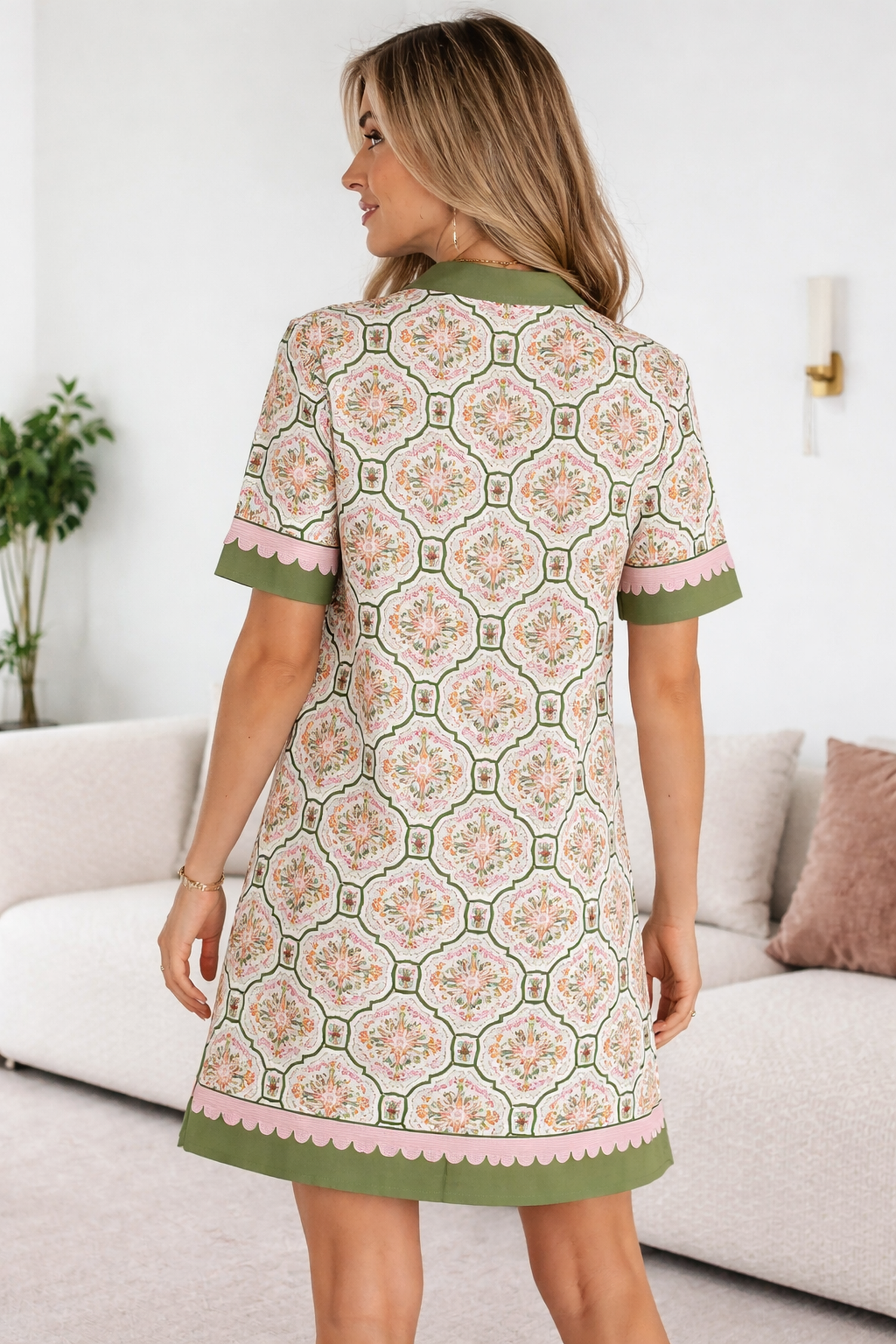 Floral Threaded Pear Galilea Sleeve Loose Mini Dress with long sleeves and a relaxed fit, shown from the back.