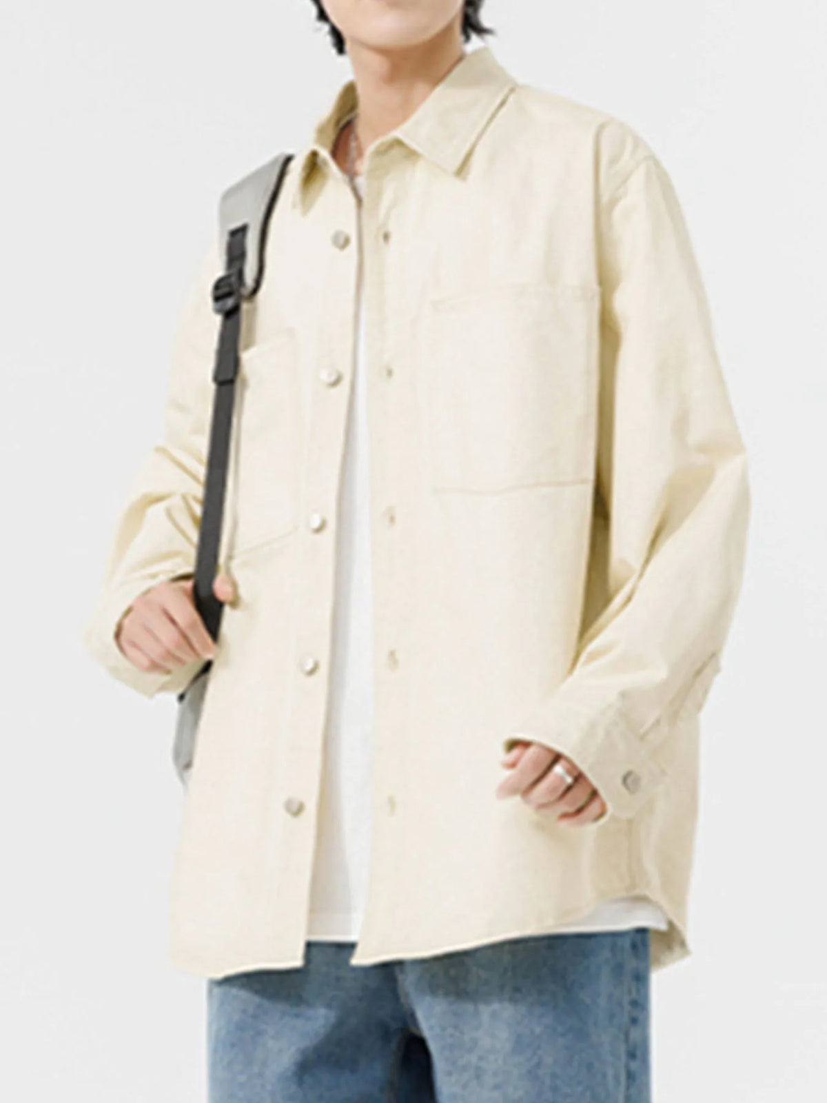 Men's long sleeve button-up shirt by Trendsi, shown in a casual fit with a classic collar and button closure.