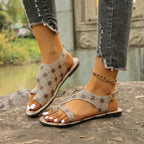 Shopimist toe loop flats sandals featuring a minimalist design with open toe and comfortable strap details.