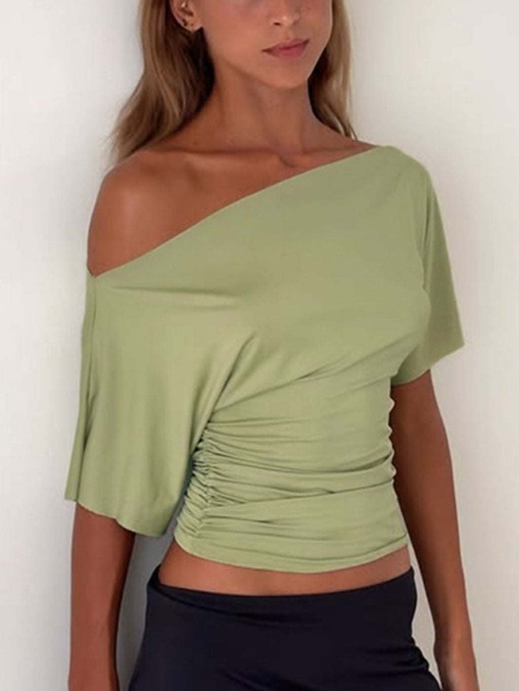 Women's one shoulder ruched short sleeve T-shirt by Trendsi, chic stretch top with fitted design and stylish asymmetrical shoulder detail.