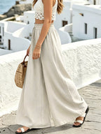 Wide leg drawstring pants by Shopimist featuring a relaxed fit and comfortable waistband, shown in a neutral fabric.