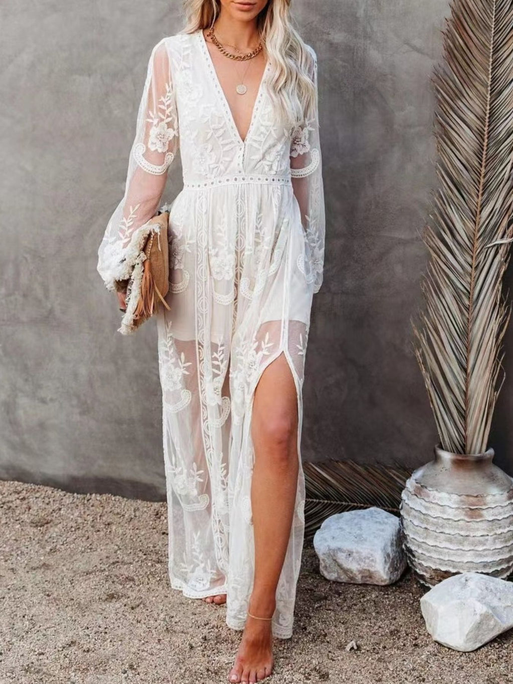 Floral lace high-slit maxi dress from Trendsi featuring intricate lace details and an elegant flowing design for formal occasions.