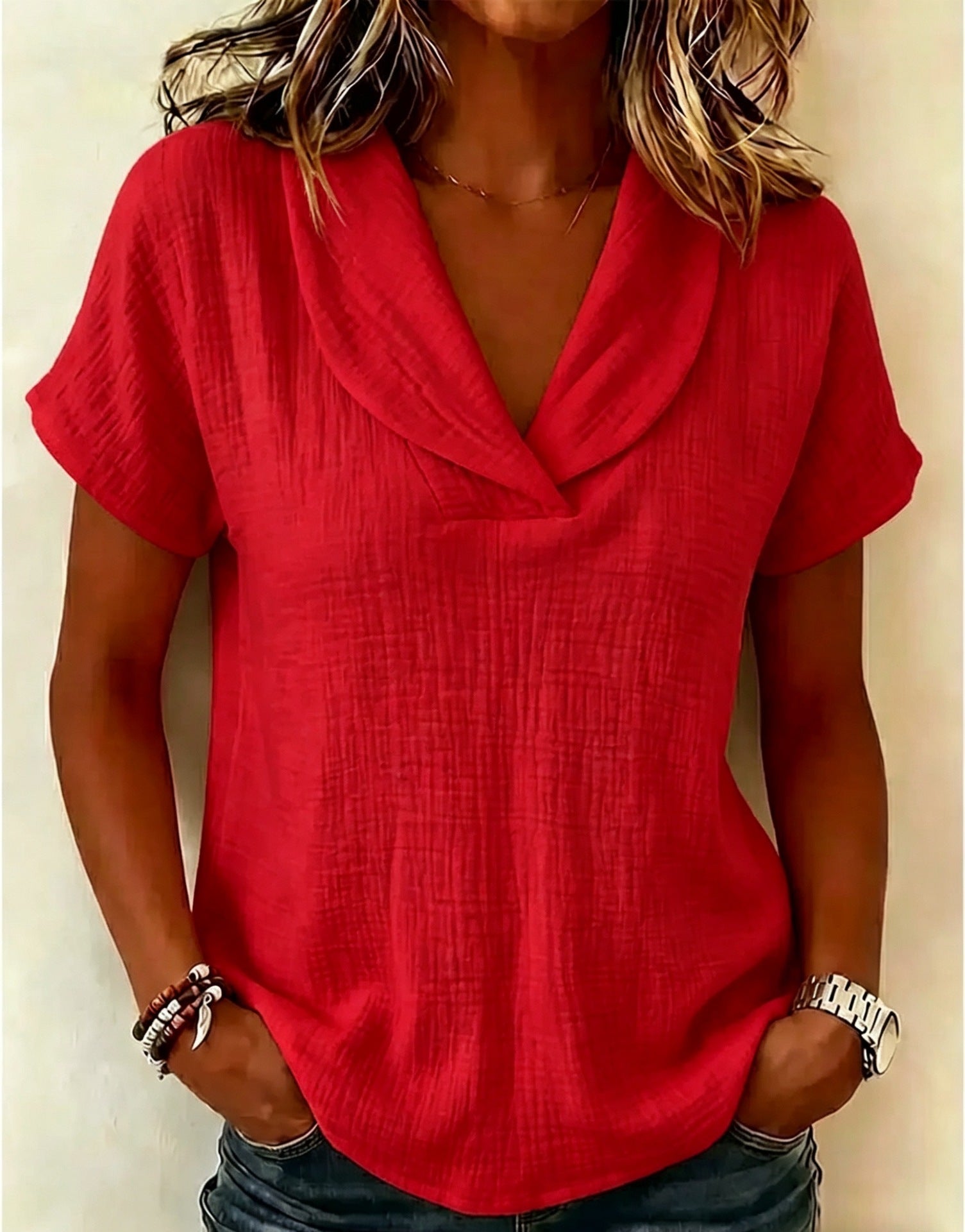 Women's knitted short-sleeve butterfly collar top by Plush Fashion Hub, showing a casual knit top with a butterfly collar design.