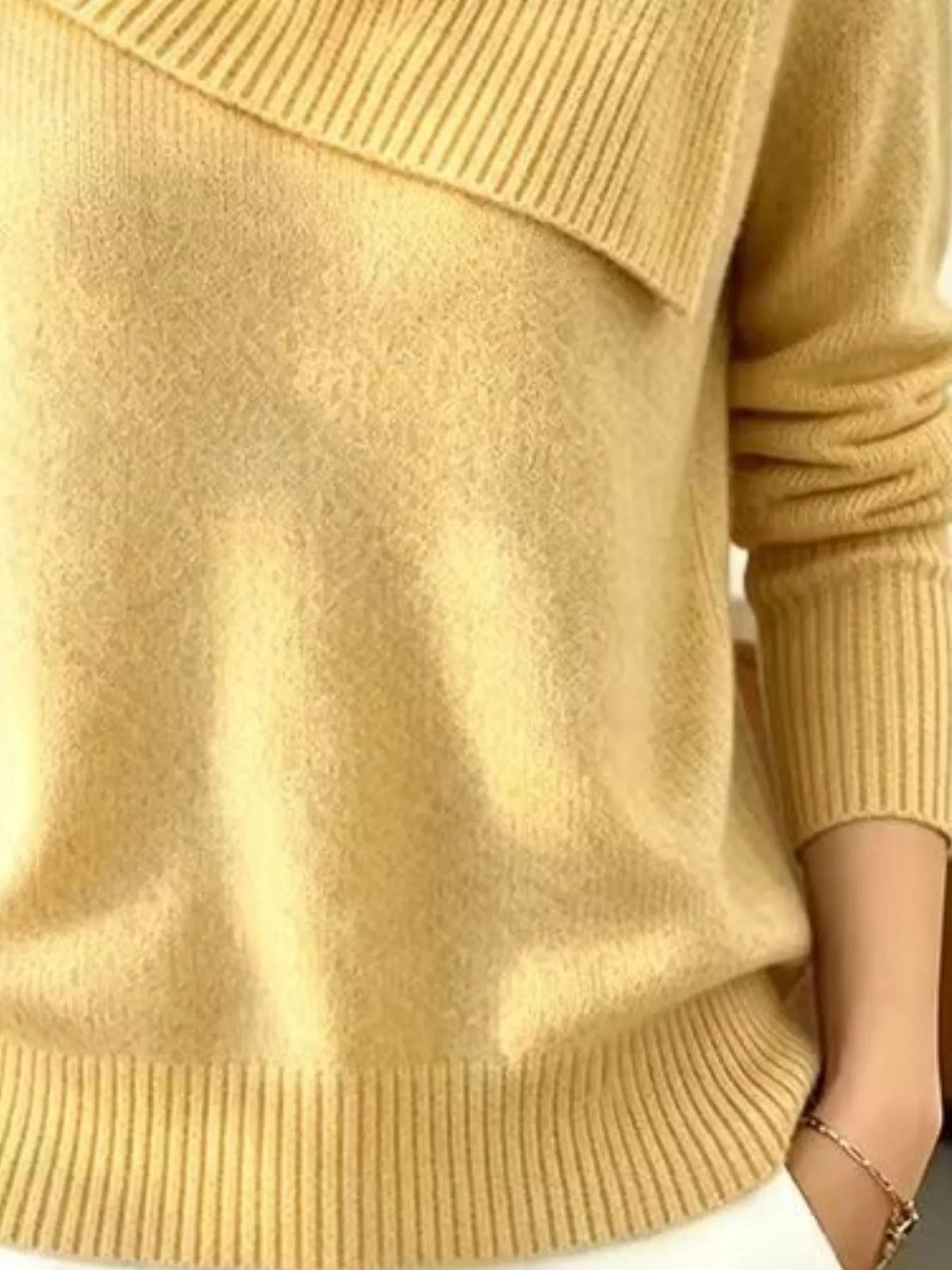 Plus size full-length sweater with asymmetric ribbed collar, stylish and cozy Trendsi sweater shown in the image.