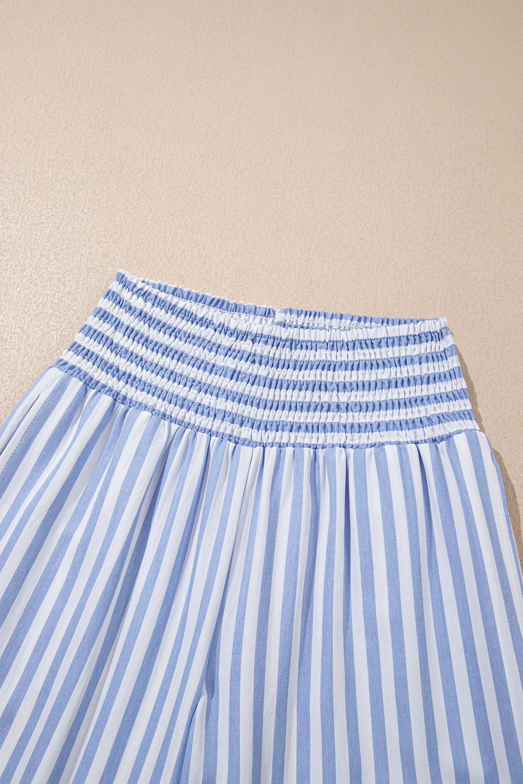 Light beige Brooke waist loose summer pants from Threaded Pear, featuring a relaxed fit and casual style for warm weather.