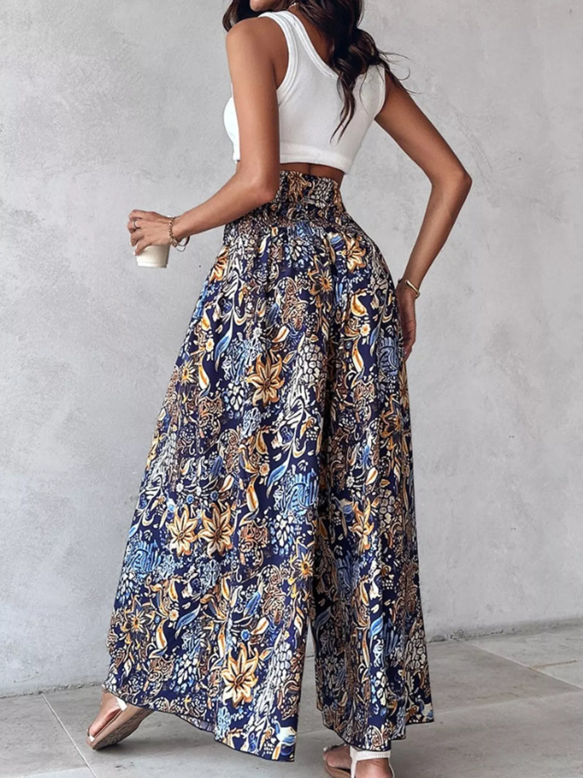 Printed wide-leg pants from Plush Fashion Hub with a relaxed fit and vibrant pattern, shown on a model against a neutral background.