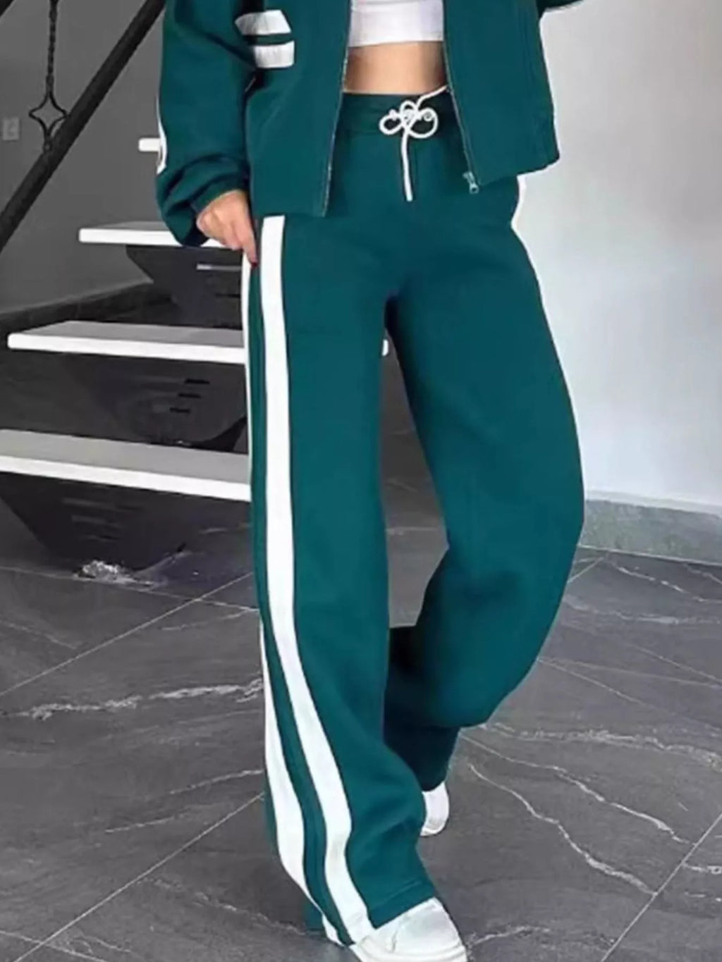 Plus size contrast stripe zip-up activewear jacket and pants set by Plush Fashion Hub, full size, stylish and comfortable.