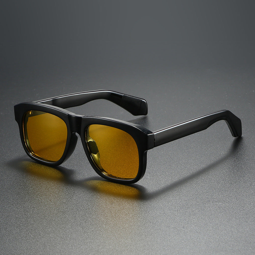 Unisex acetate-style polarized fashion sunglasses with a luxury look, featuring stylish frames and tinted lenses.