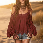 Women's ruffle detail puff sleeve blouse with strap layers and lace-look design by Plush Fashion Hub.