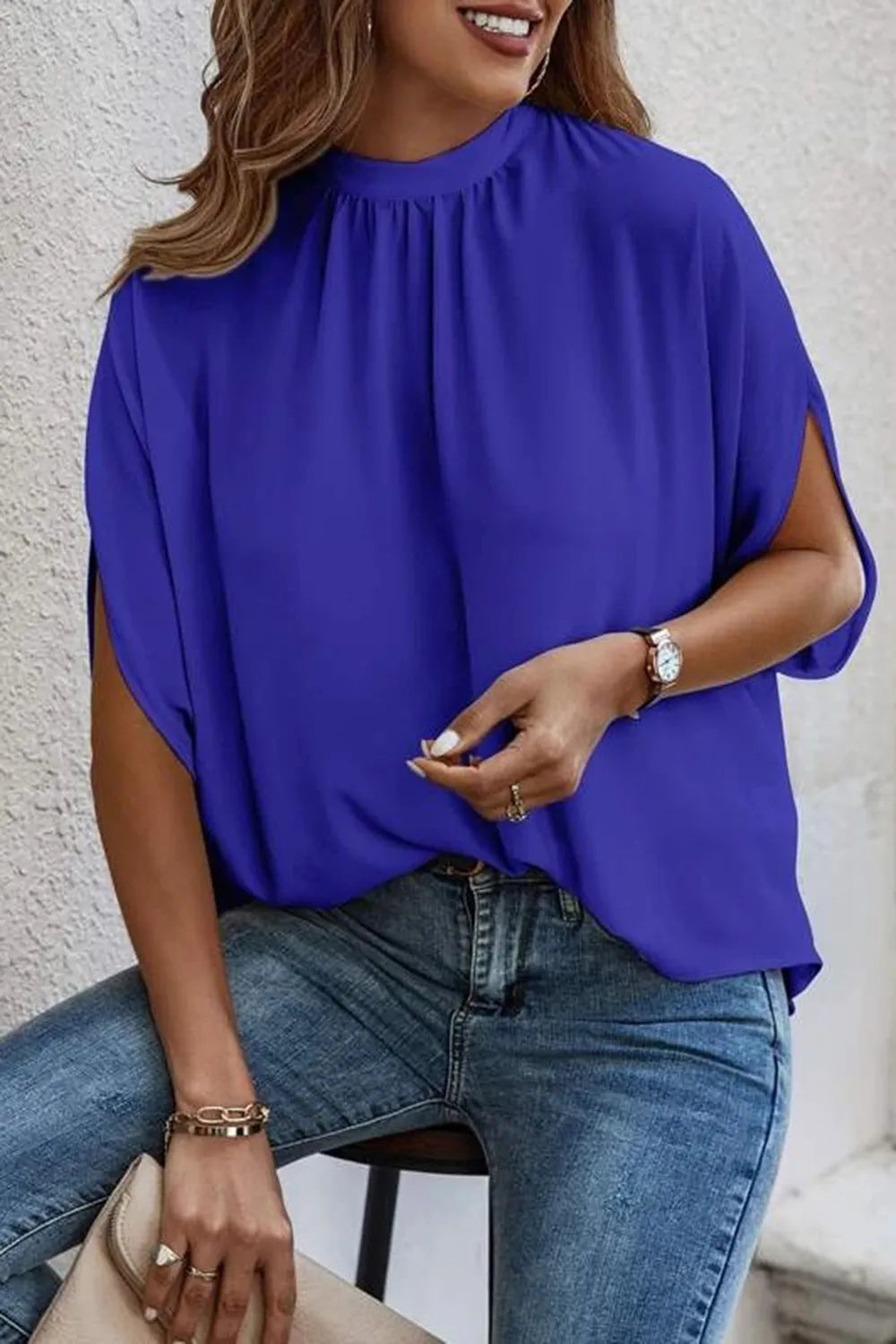 Elegant Plush Fashion Hub tie-back half-sleeve blouse with side slit, showcasing a stylish and comfortable tops design.