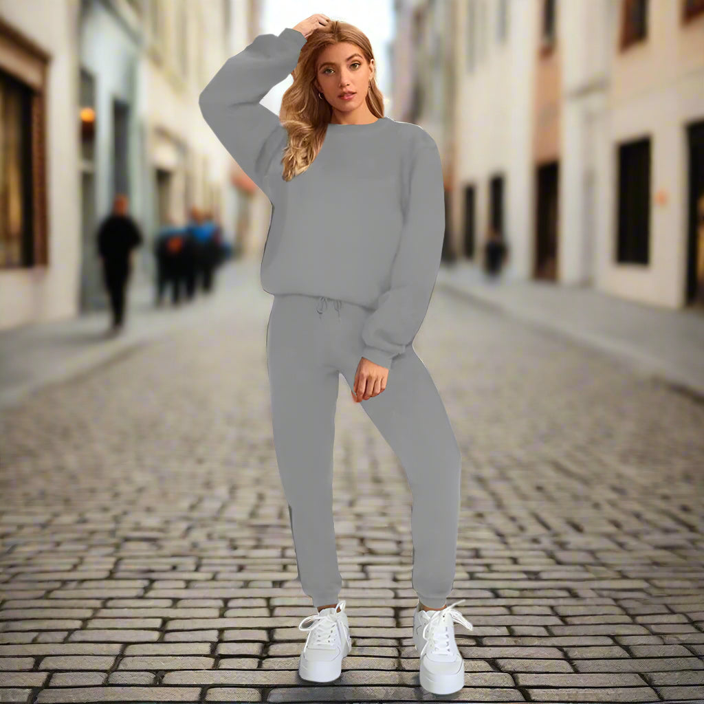 Women's solid color round neck sweatshirt and pants set by Plush Fashion Hub, casualwear with a comfortable fit and simple style.