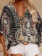 Women's printed V-neck half sleeve casual top by Plush Fashion Hub, featuring soft stretchy fabric and a stylish office blouse design.