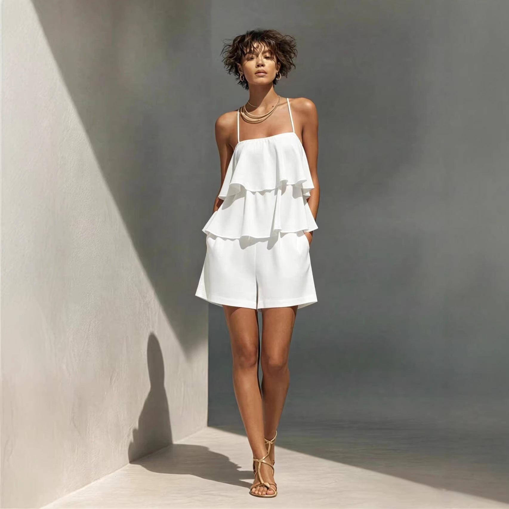 Women's multi-layer ruffle camisole and shorts casualwear set by FitiqueFit, featuring layered ruffle details and comfortable fit.