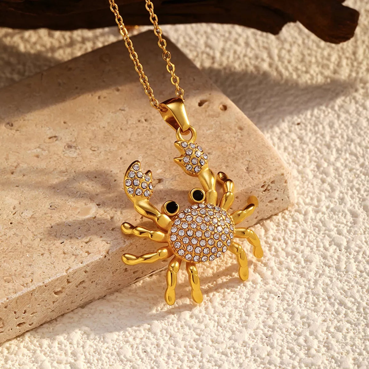 18K gold-plated crab pendant necklace with detailed crab charm, jewelry piece from Plush Fashion Hub displayed on a white background