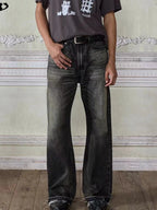 Men's vintage washed frayed hem denim jeans by Plush Fashion Hub, showcasing distressed details and relaxed fit.