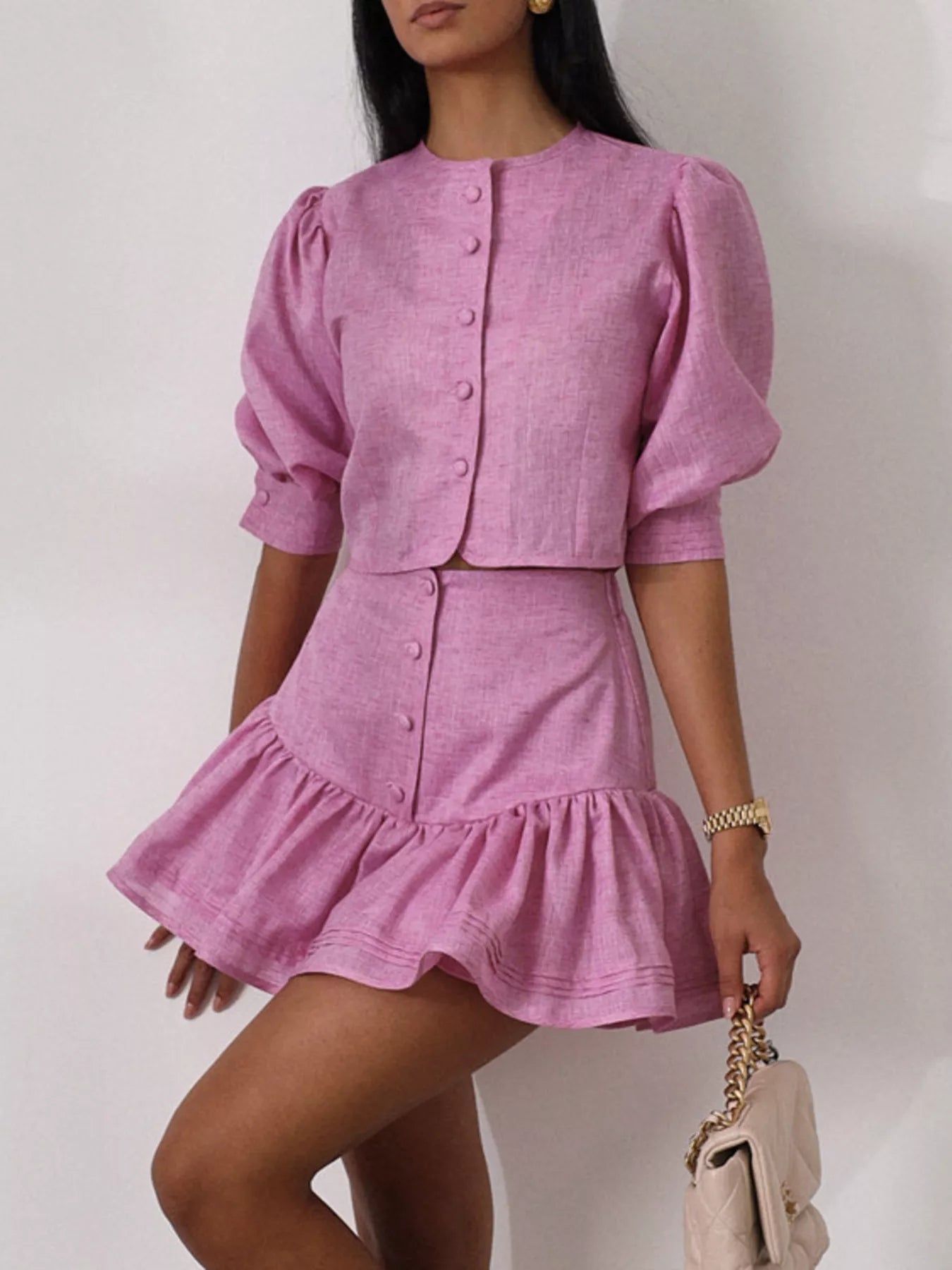Shopimist puff sleeve cropped top and ruffled skirt set, featuring stylish puff sleeves and feminine ruffle details.