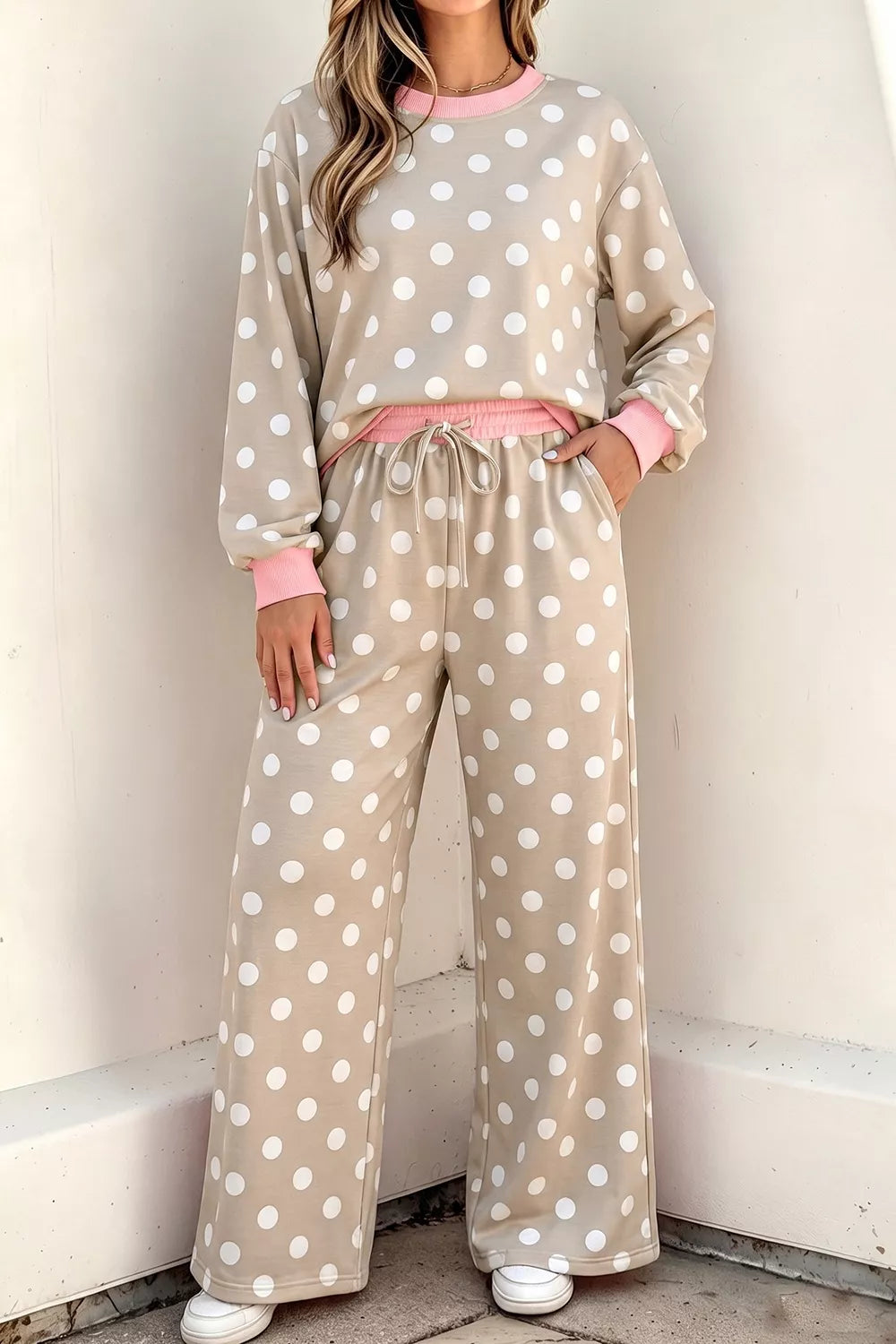 Polka dot contrast trim long sleeve top and drawstring shift pants set by Trendsi, featuring a stylish, coordinated casual outfit.
