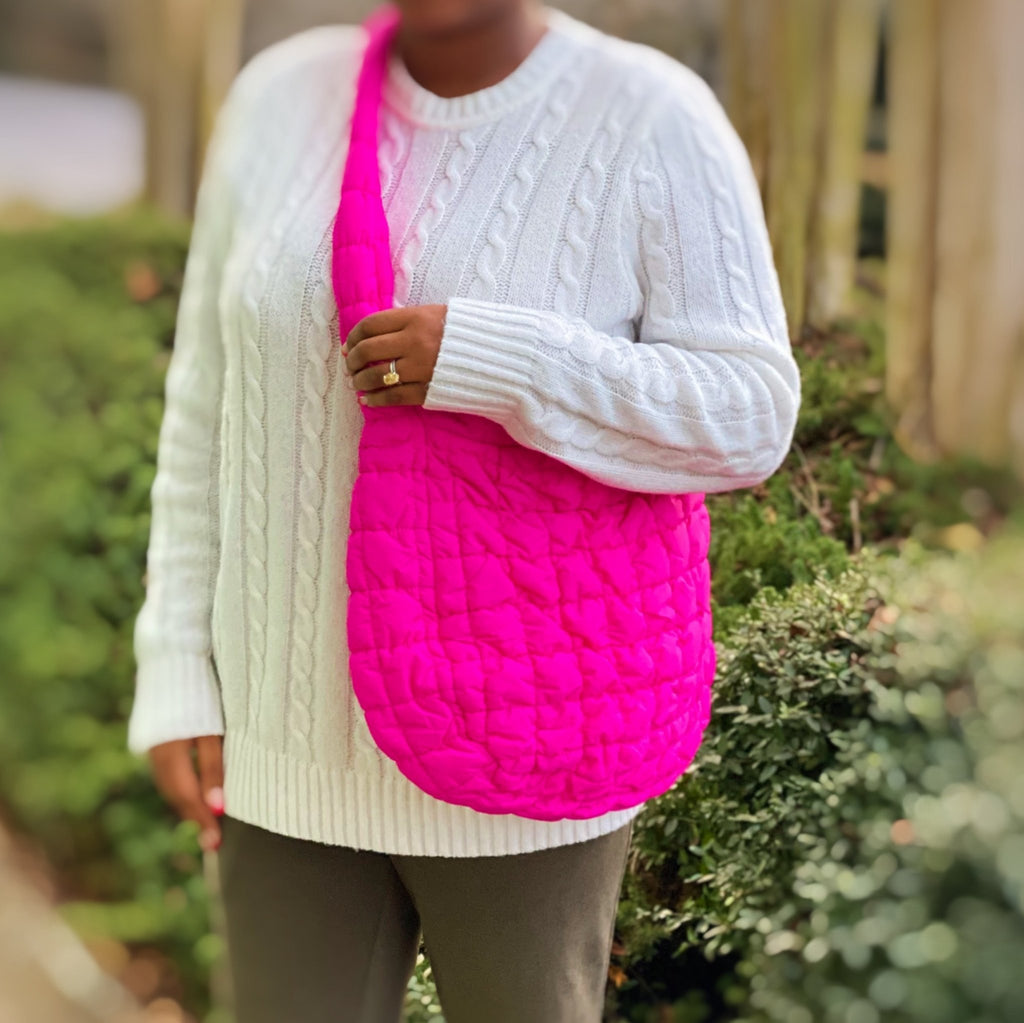 Plush Fashion Hub quilted carry-all crossbody bag with adjustable strap and spacious interior in a stylish design.