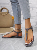 Women's casual ankle strap flat sandals with toe post design, comfortable summer shoes by Trendsi.