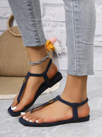 Women's casual ankle strap flat sandals with toe post design, trendy summer shoes from Trendsi.