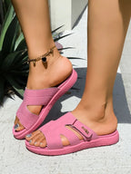 Women's casual faux leather cut-out platform slide sandals with open toes and chunky soles by Trendsi.