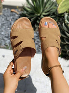 Women's casual faux leather platform slide sandals with cut-out design and comfortable slip-on style by Trendsi.