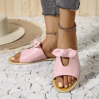 Women’s casual open-toe faux leather flats with cutout detail, perfect for comfortable summer sandal style.