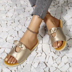Women's open-toe cutout faux leather flats, comfortable summer sandals with casual style and breathable design.