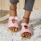 Women's casual open-toe faux leather flats with cutout details, perfect for summer comfort and stylish everyday wear.