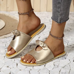 Women's casual open-toe faux leather flats with cutout detail, perfect for comfortable summer sandals.