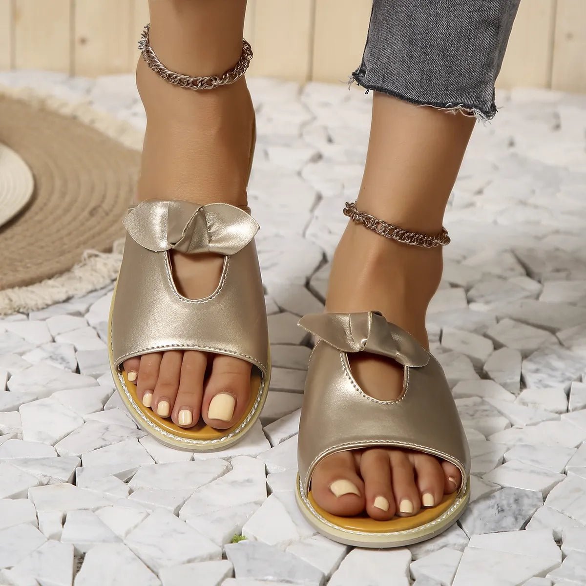 Women's casual open-toe faux leather flats with cutout details, perfect for summer comfort and stylish everyday wear.